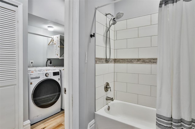 4412 Chouteau, Saint Louis, MO 63110 - bathroom featuring washer / clothes dryer, shower / tub combo, and wood finished floors
