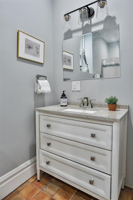 4412 Chouteau, Saint Louis, MO 63110 - bathroom featuring vanity and baseboards