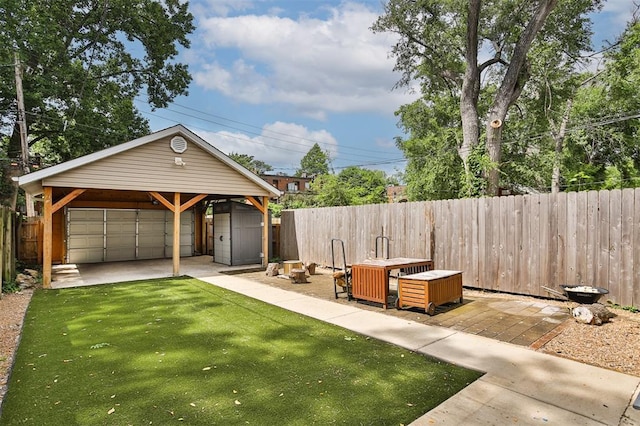4412 Chouteau, Saint Louis, MO 63110 - view of yard featuring an outdoor structure and a garage