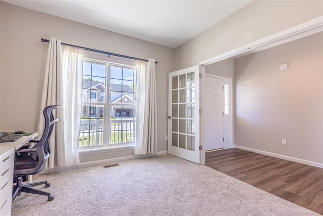 1051 Miremont Dr, Manchester, MO 63011 - unfurnished office with healthy amount of natural light, baseboards, and carpet flooring