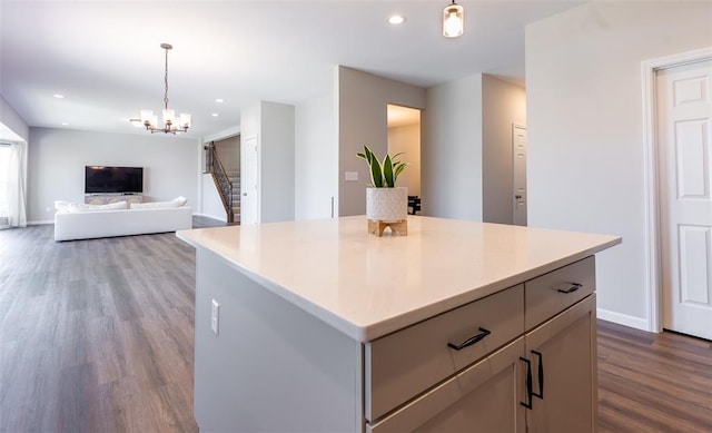 1051 Miremont Dr, Manchester, MO 63011 - kitchen featuring dark wood-type flooring, hanging light fixtures, recessed lighting, a chandelier, and light countertops