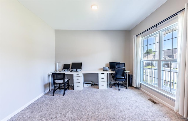 1051 Miremont Dr, Manchester, MO 63011 - carpeted home office with healthy amount of natural light and baseboards