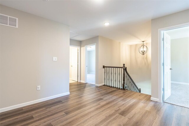 1051 Miremont Dr, Manchester, MO 63011 - empty room with wood finished floors and baseboards