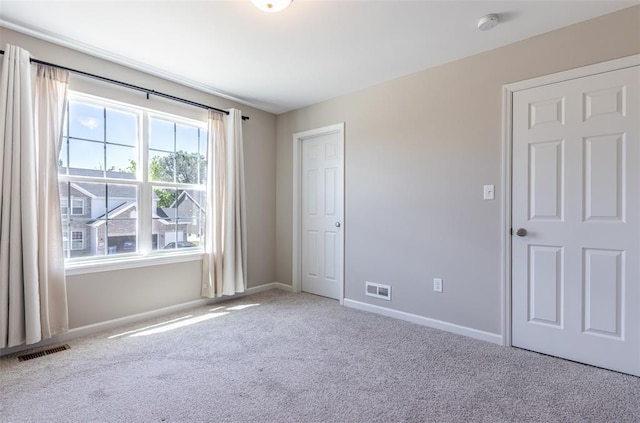 1051 Miremont Dr, Manchester, MO 63011 - spare room featuring carpet and baseboards