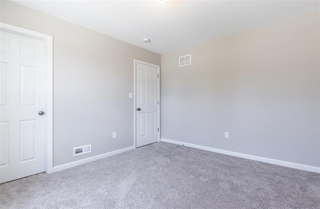 1051 Miremont Dr, Manchester, MO 63011 - carpeted empty room with baseboards