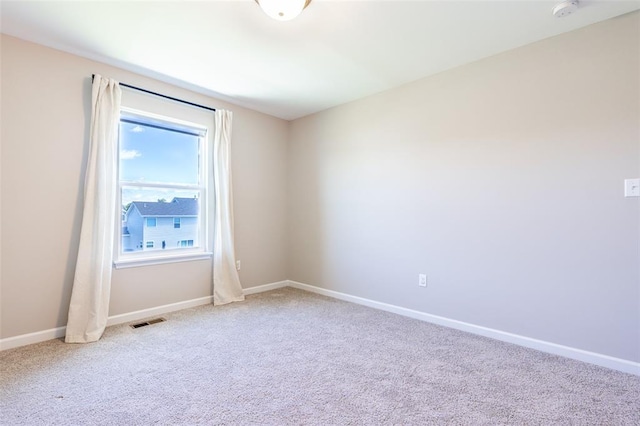 1051 Miremont Dr, Manchester, MO 63011 - carpeted spare room with baseboards and a smoke detector