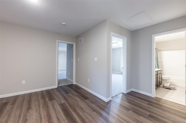 1051 Miremont Dr, Manchester, MO 63011 - empty room with dark wood-type flooring and baseboards
