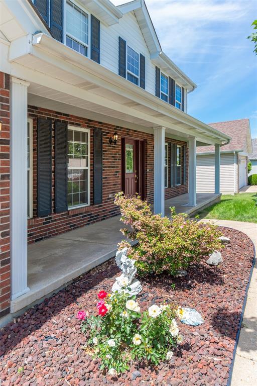 326 Merrimac Downs, Saint Peters, MO 63376 - entrance to property featuring covered porch and brick siding