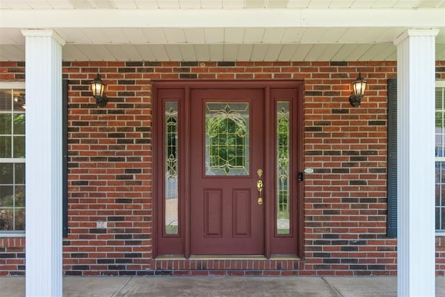 326 Merrimac Downs, Saint Peters, MO 63376 - view of exterior entry with brick siding and a porch