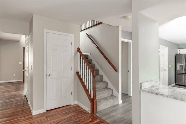 326 Merrimac Downs, Saint Peters, MO 63376 - stairway featuring wood finished floors and baseboards