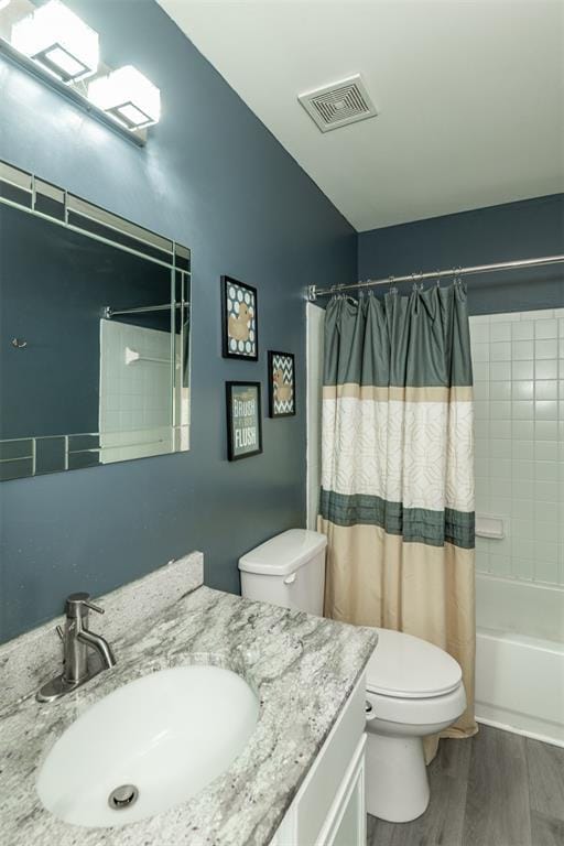 326 Merrimac Downs, Saint Peters, MO 63376 - full bathroom with toilet, vanity, shower / bath combo with shower curtain, and wood finished floors