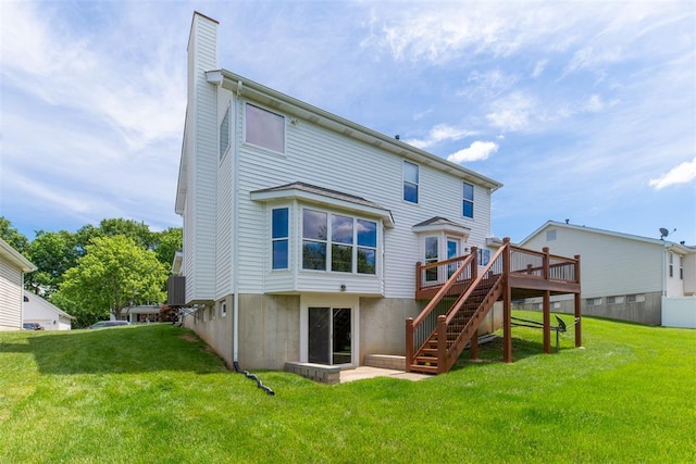 326 Merrimac Downs, Saint Peters, MO 63376 - back of house with stairs, a deck, a chimney, and a lawn