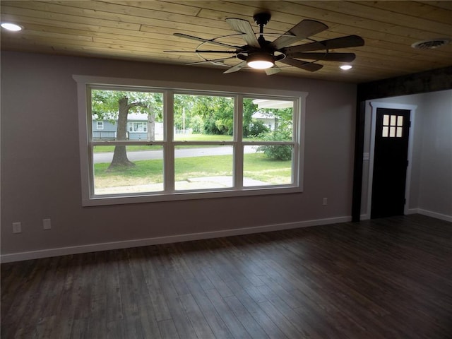 633 E Eldon St, St James, MO 65559 - unfurnished room featuring healthy amount of natural light, wood ceiling, baseboards, a ceiling fan, and dark wood-style flooring