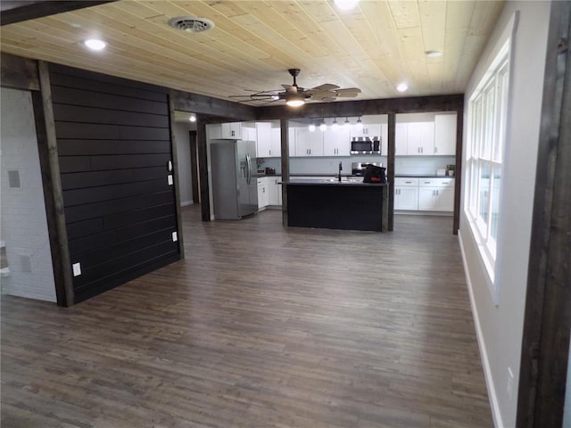 633 E Eldon St, St James, MO 65559 - kitchen with stainless steel appliances, dark countertops, wood ceiling, ceiling fan, and a sink