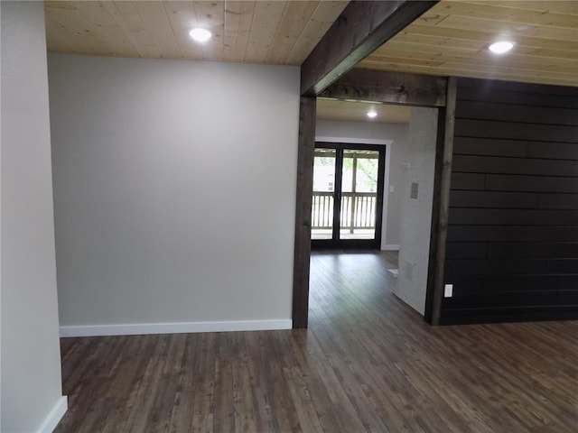 633 E Eldon St, St James, MO 65559 - empty room featuring dark wood-style flooring, baseboards, recessed lighting, and wood ceiling
