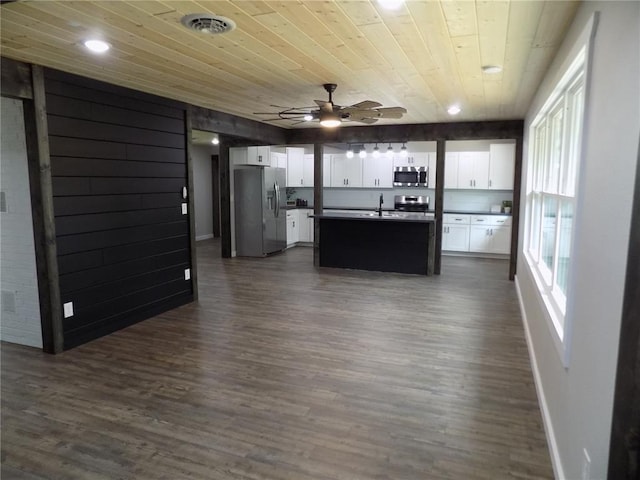 633 E Eldon St, St James, MO 65559 - kitchen with stainless steel appliances, a sink, wooden ceiling, ceiling fan, and white cabinets