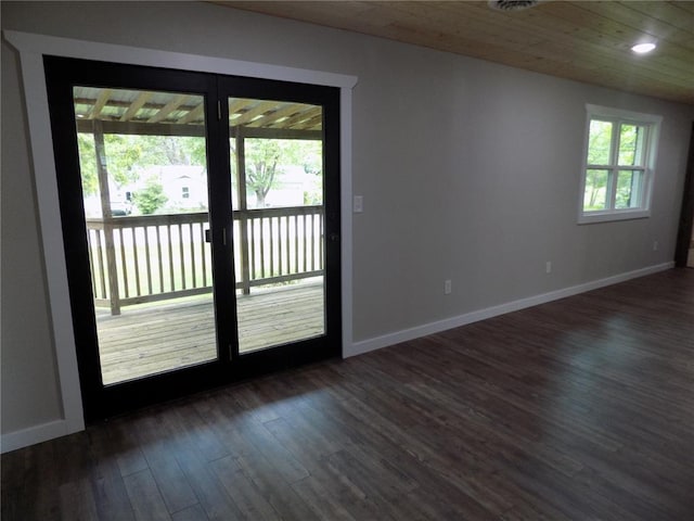 633 E Eldon St, St James, MO 65559 - spare room with dark wood-style flooring, baseboards, and recessed lighting