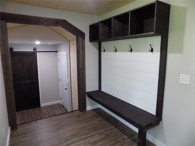 633 E Eldon St, St James, MO 65559 - mudroom with a barn door, wood finished floors, and baseboards