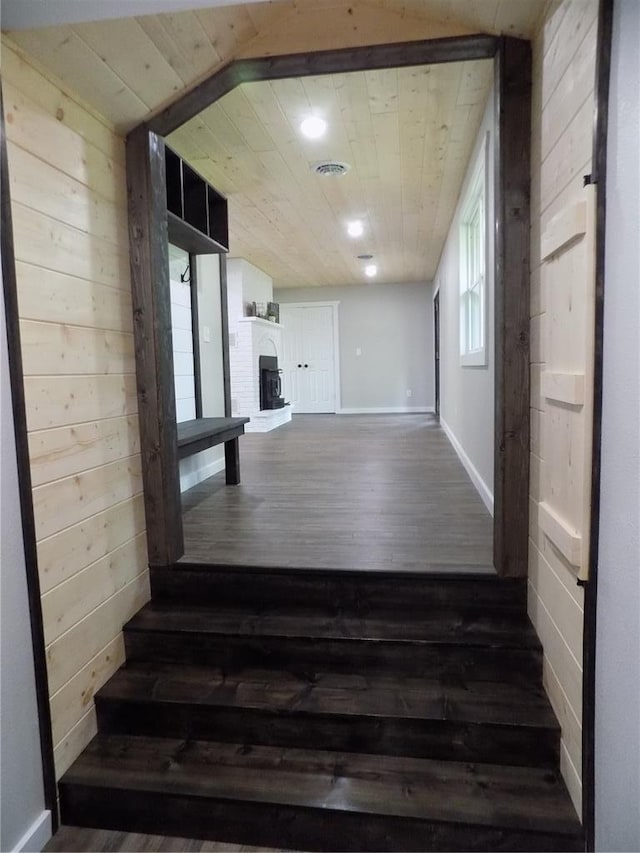 633 E Eldon St, St James, MO 65559 - hallway with wood finished floors, baseboards, wooden ceiling, wooden walls, and recessed lighting