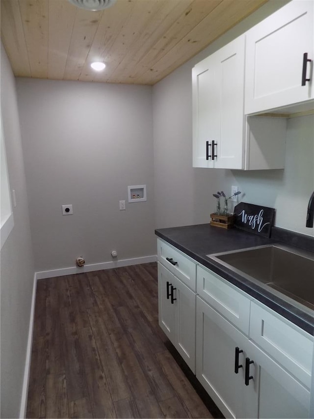 633 E Eldon St, St James, MO 65559 - laundry room with hookup for a washing machine, cabinet space, wood ceiling, dark wood finished floors, and hookup for an electric dryer