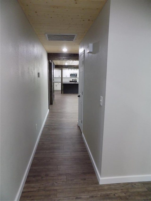 633 E Eldon St, St James, MO 65559 - hall with baseboards and dark wood-style floors