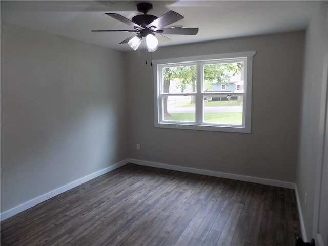 633 E Eldon St, St James, MO 65559 - unfurnished room with dark wood-style flooring, baseboards, and a ceiling fan
