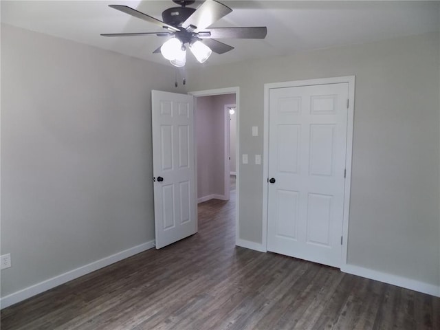 633 E Eldon St, St James, MO 65559 - unfurnished bedroom featuring wood finished floors, baseboards, and ceiling fan