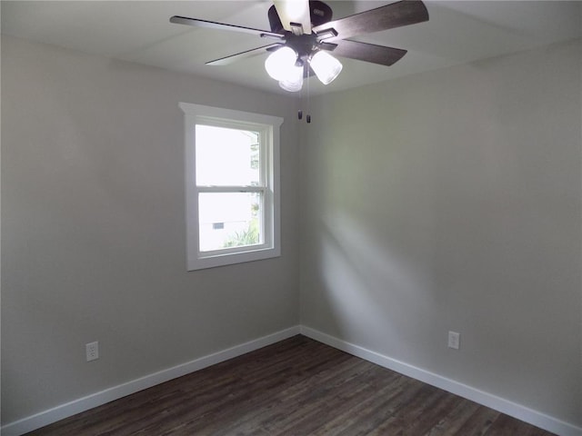 633 E Eldon St, St James, MO 65559 - spare room with ceiling fan, baseboards, and dark wood finished floors