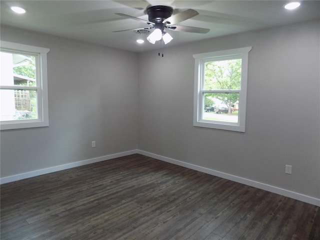 633 E Eldon St, St James, MO 65559 - spare room featuring dark wood-style flooring, recessed lighting, ceiling fan, and baseboards