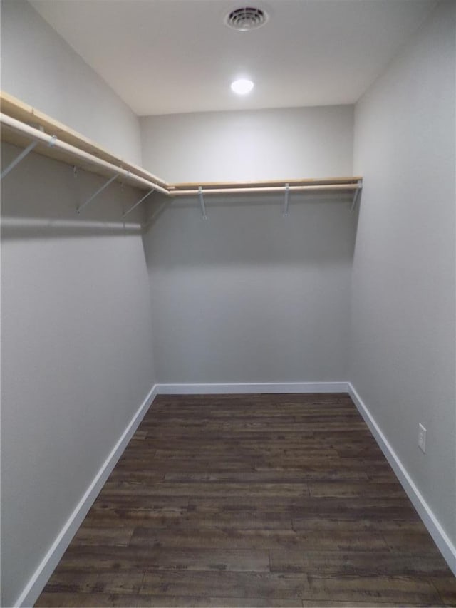 633 E Eldon St, St James, MO 65559 - walk in closet featuring dark wood-style floors