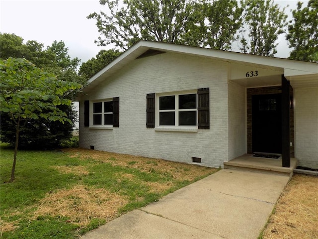 633 E Eldon St, St James, MO 65559 - bungalow-style home with crawl space, brick siding, and a front yard