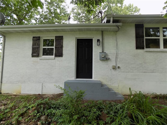 633 E Eldon St, St James, MO 65559 - property entrance with brick siding