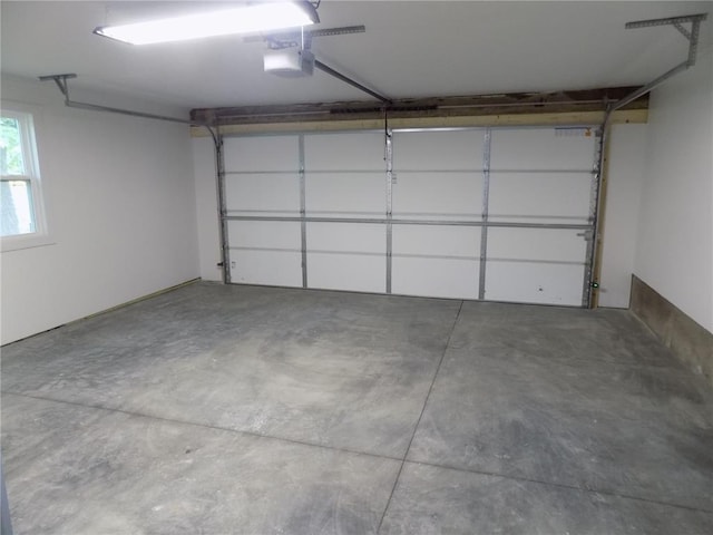 633 E Eldon St, St James, MO 65559 - garage featuring a garage door opener
