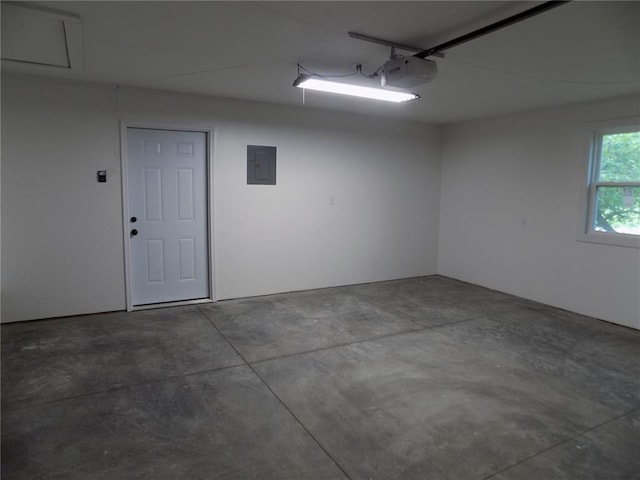 633 E Eldon St, St James, MO 65559 - garage with electric panel and a garage door opener