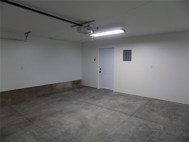 633 E Eldon St, St James, MO 65559 - garage featuring electric panel and a garage door opener