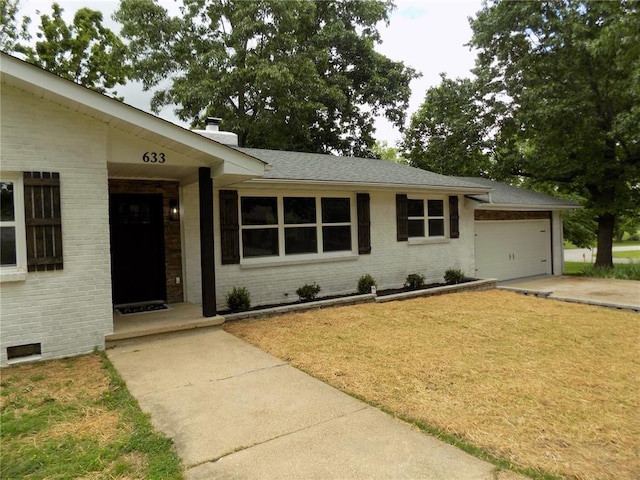 633 E Eldon St, St James, MO 65559 - ranch-style house with brick siding, a chimney, a front lawn, and an attached garage