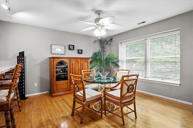 537 Colebrook Dr Unit C, Webster Groves, MO 63119 - dining space featuring a ceiling fan, light wood-type flooring, and baseboards