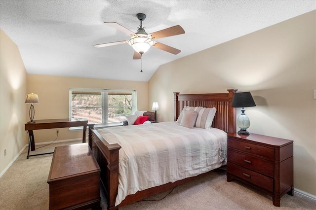 537 Colebrook Dr Unit C, Webster Groves, MO 63119 - bedroom with light carpet, lofted ceiling, baseboards, ceiling fan, and a textured ceiling