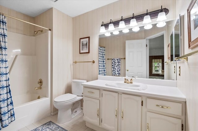 537 Colebrook Dr Unit C, Webster Groves, MO 63119 - full bathroom featuring tile patterned floors, toilet, shower / bath combo with shower curtain, vanity, and wallpapered walls