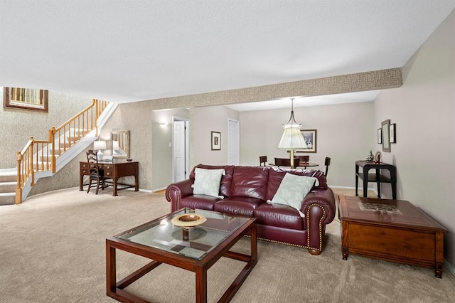 537 Colebrook Dr Unit C, Webster Groves, MO 63119 - carpeted living room with stairway, baseboards, and wallpapered walls