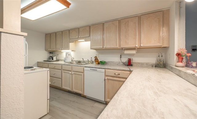 17130 State Route F, St James, MO 65559 - kitchen featuring dishwasher, light brown cabinetry, stove, a sink, and light countertops