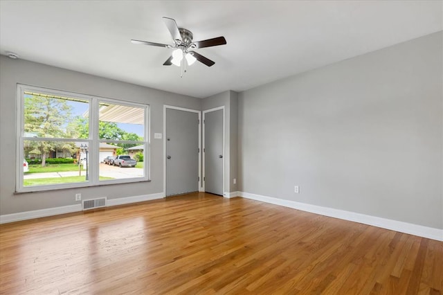 11550 Rock Hampton Dr, Hazelwood, MO 63138 - empty room with baseboards, ceiling fan, and light wood-style floors