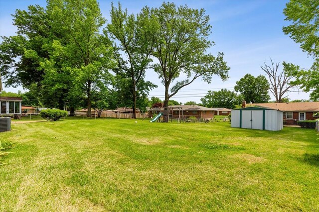 11550 Rock Hampton Dr, Hazelwood, MO 63138 - view of yard with a playground and central air condition unit
