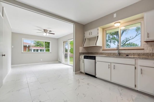 11550 Rock Hampton Dr, Hazelwood, MO 63138 - kitchen featuring dishwasher, a sink, light marble finish floors, tasteful backsplash, and baseboards