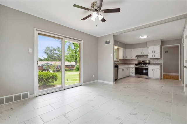 11550 Rock Hampton Dr, Hazelwood, MO 63138 - kitchen with stainless steel appliances, light marble finish flooring, and ceiling fan