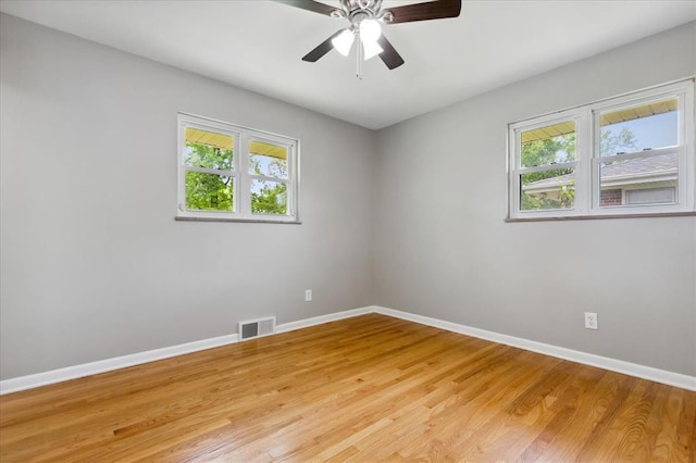 11550 Rock Hampton Dr, Hazelwood, MO 63138 - unfurnished room featuring baseboards, light wood finished floors, and a ceiling fan