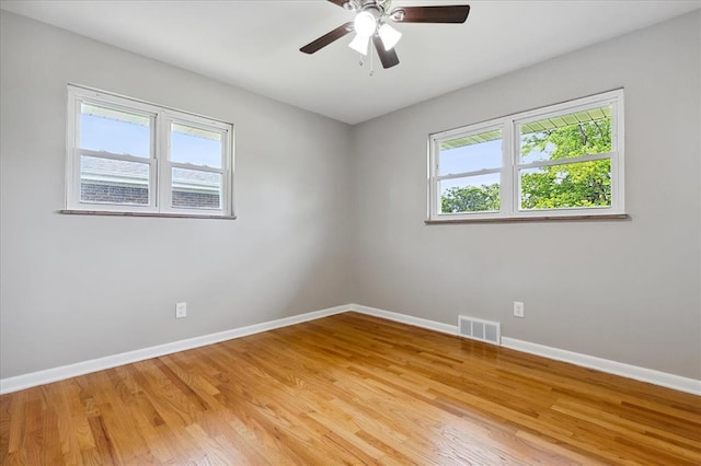 11550 Rock Hampton Dr, Hazelwood, MO 63138 - unfurnished room featuring baseboards, light wood finished floors, and a ceiling fan