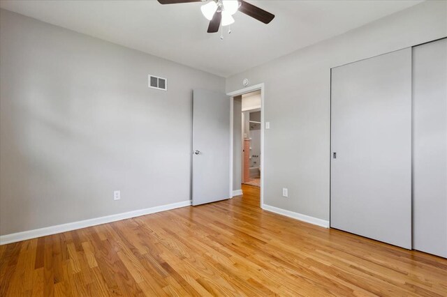 11550 Rock Hampton Dr, Hazelwood, MO 63138 - unfurnished bedroom featuring baseboards, light wood-style flooring, a closet, and ceiling fan