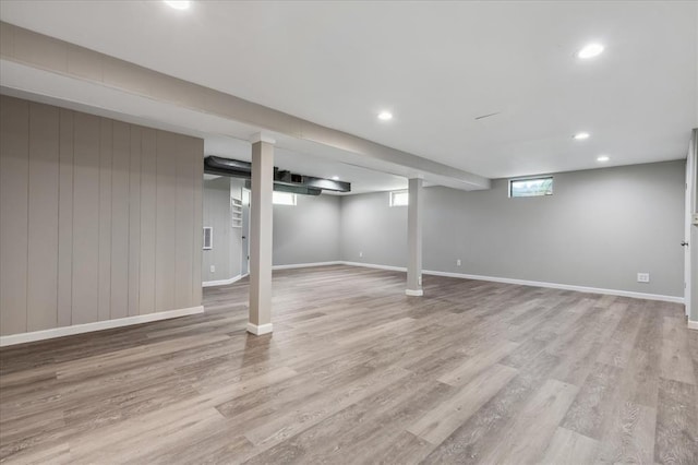 11550 Rock Hampton Dr, Hazelwood, MO 63138 - basement with light wood-type flooring, baseboards, and recessed lighting