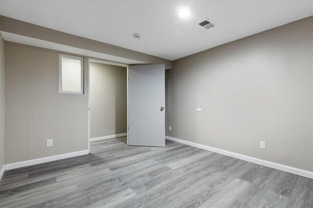 11550 Rock Hampton Dr, Hazelwood, MO 63138 - finished below grade area with wood finished floors and baseboards